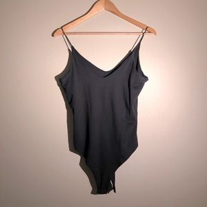 Plain black body suit, lightly worn, size m